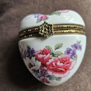 Small porcelain heart shaped trinket box dated 2000.
